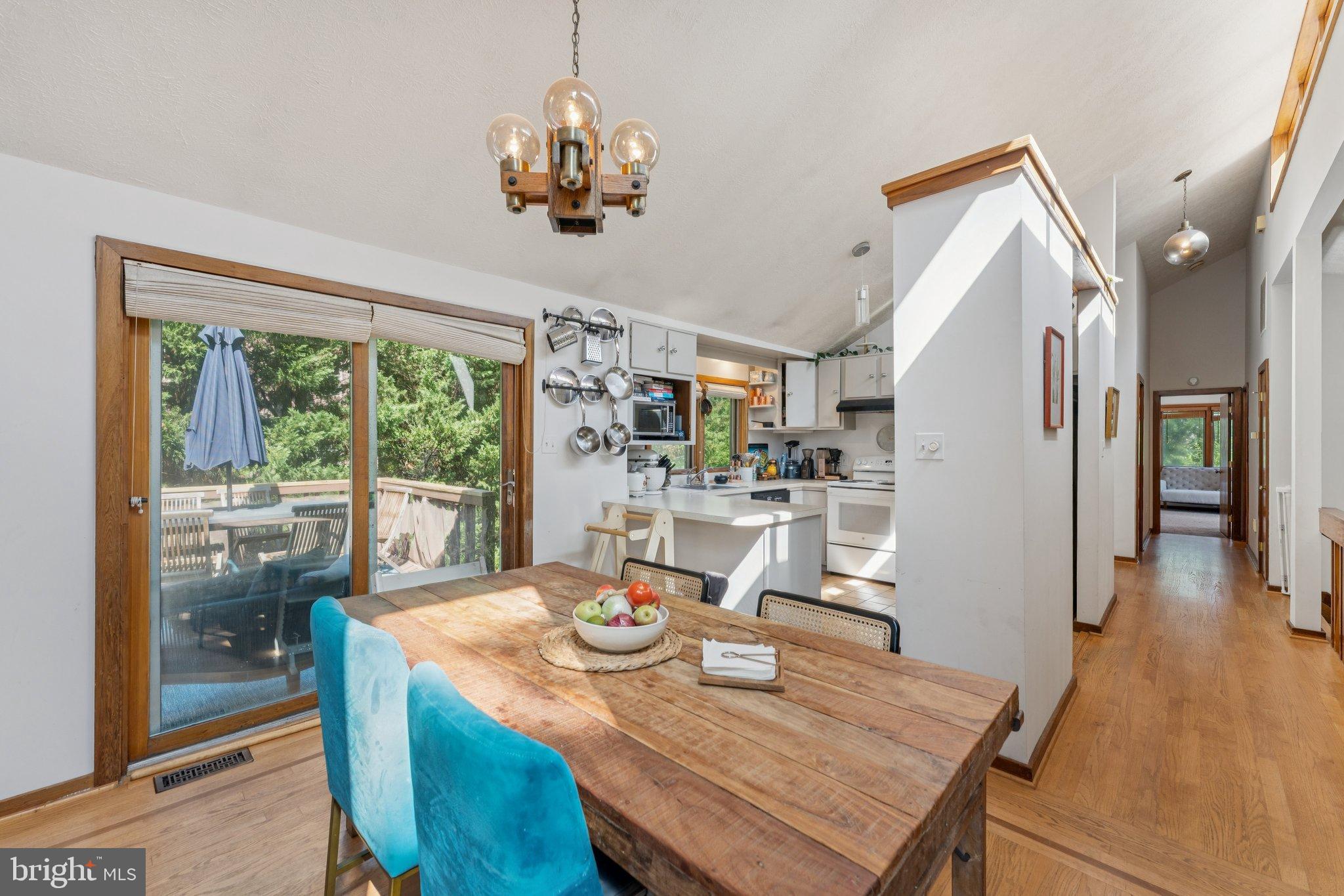 1684 Chain Bridge Road McLean, VA 22101 - Photo 9 of 23 a view of a dining room with furniture wooden floor and chandelier