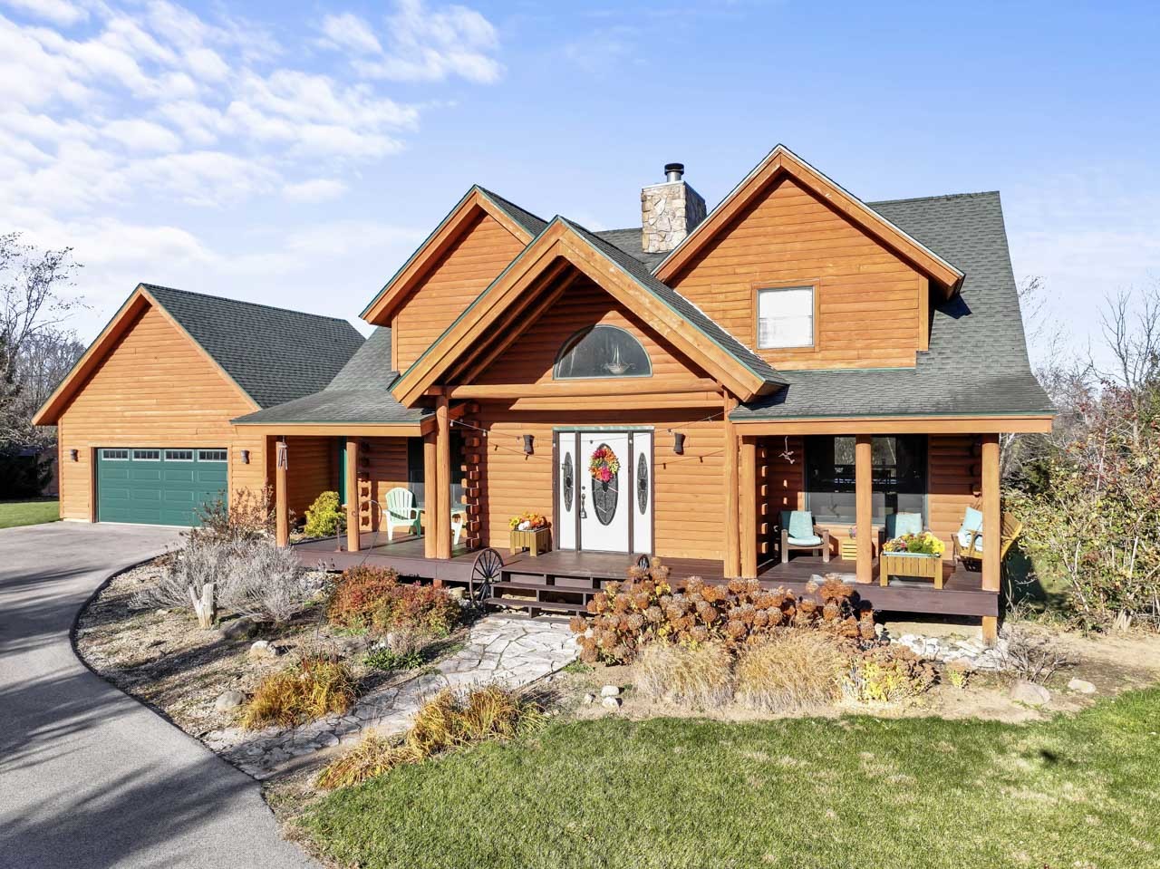 18508 128th Street Bristol, WI 53104 - Photo 2 of 48 a front view of house with yard porch and furniture