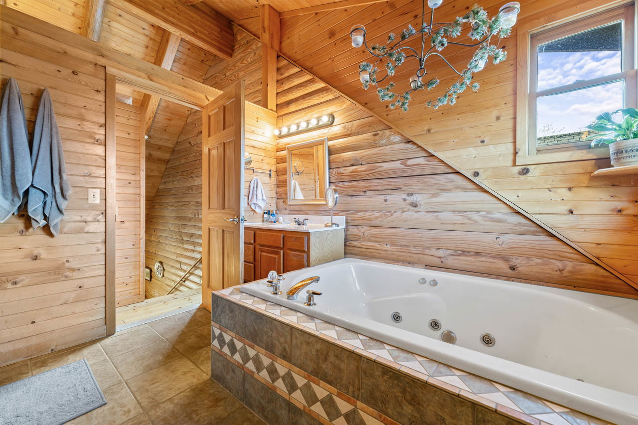 18508 128th Street Bristol, WI 53104 - Photo 29 of 48 a bathroom with bathtub and shower