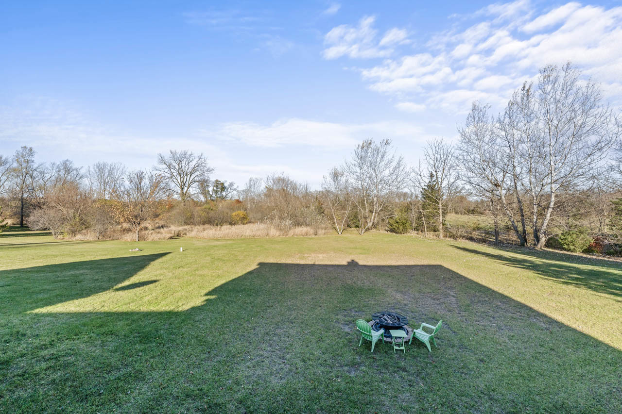 18508 128th Street Bristol, WI 53104 - Photo 39 of 48 a view of a lake with a yard