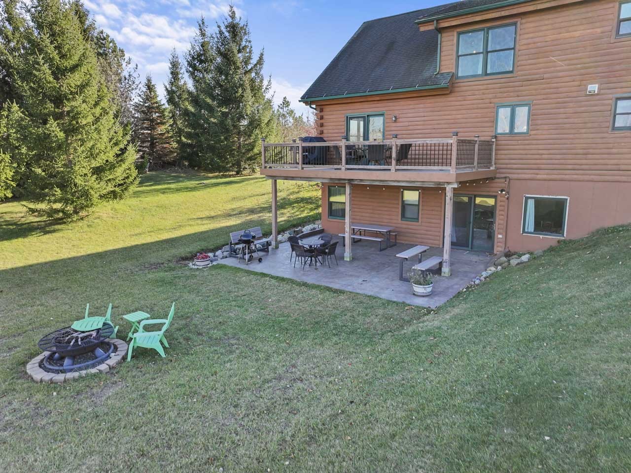 18508 128th Street Bristol, WI 53104 - Photo 40 of 48 a view of a house with backyard porch and sitting area