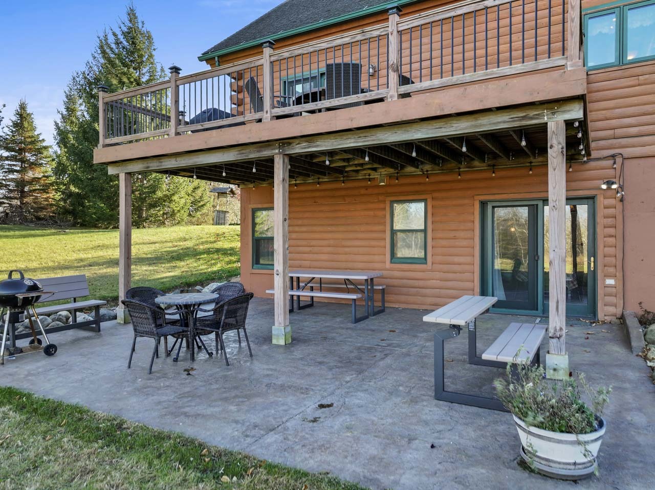 18508 128th Street Bristol, WI 53104 - Photo 42 of 48 a front view of a house with outdoor seating yard