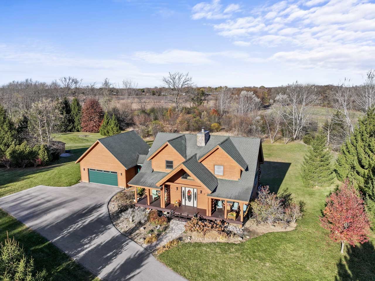 18508 128th Street Bristol, WI 53104 - Photo 45 of 48 an aerial view of residential houses with outdoor space and trees