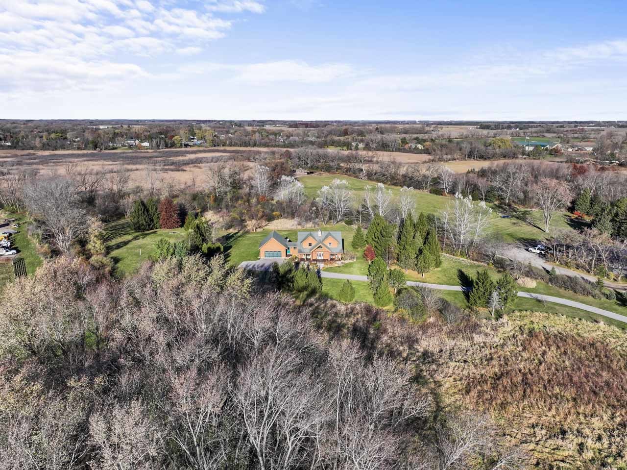 18508 128th Street Bristol, WI 53104 - Photo 47 of 48 a view of a lake with a city