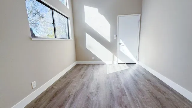 a view of entryway with wooden floor