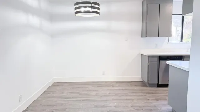 a view of kitchen and sink