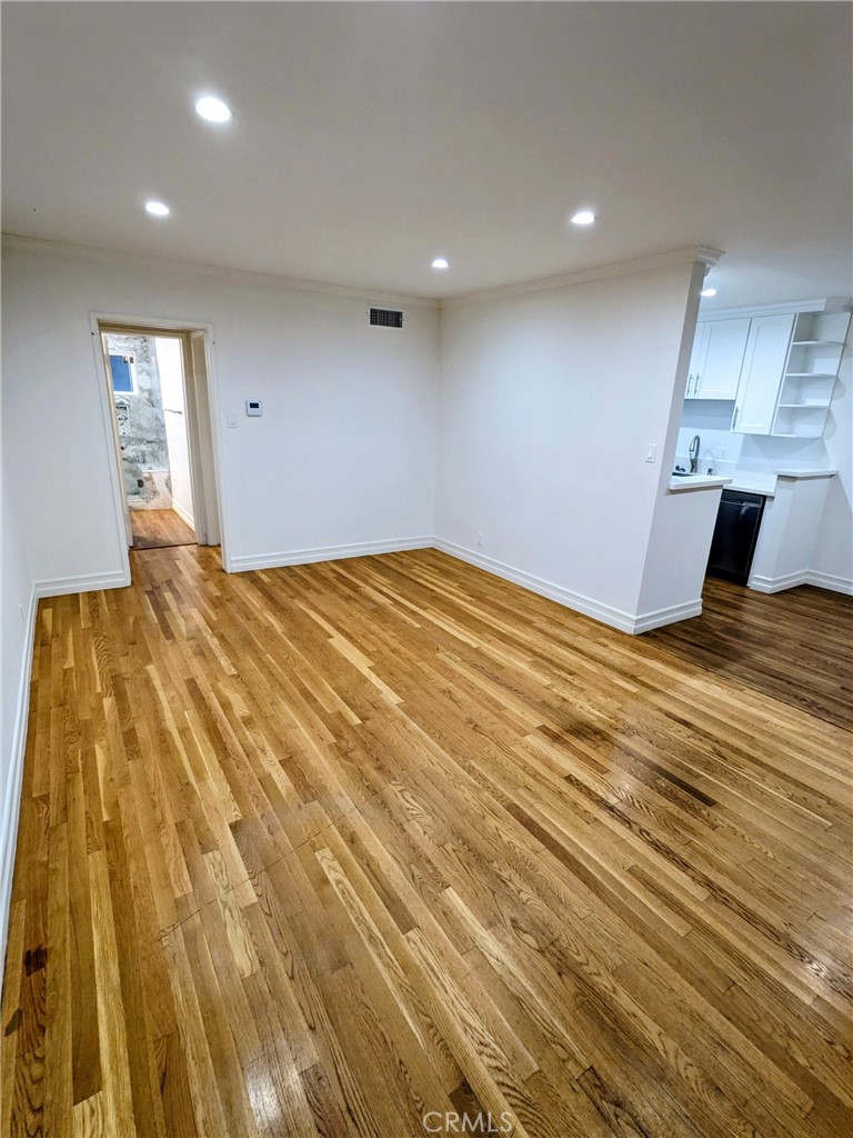 1019 6th Street, Unit 2 Santa Monica, CA 90403 - Photo 3 of 15 a view of a bedroom with a bed and a window