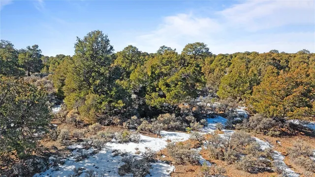 a view of beach and mountain