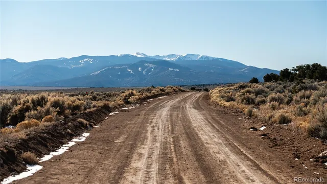 a view of a house with a mountain