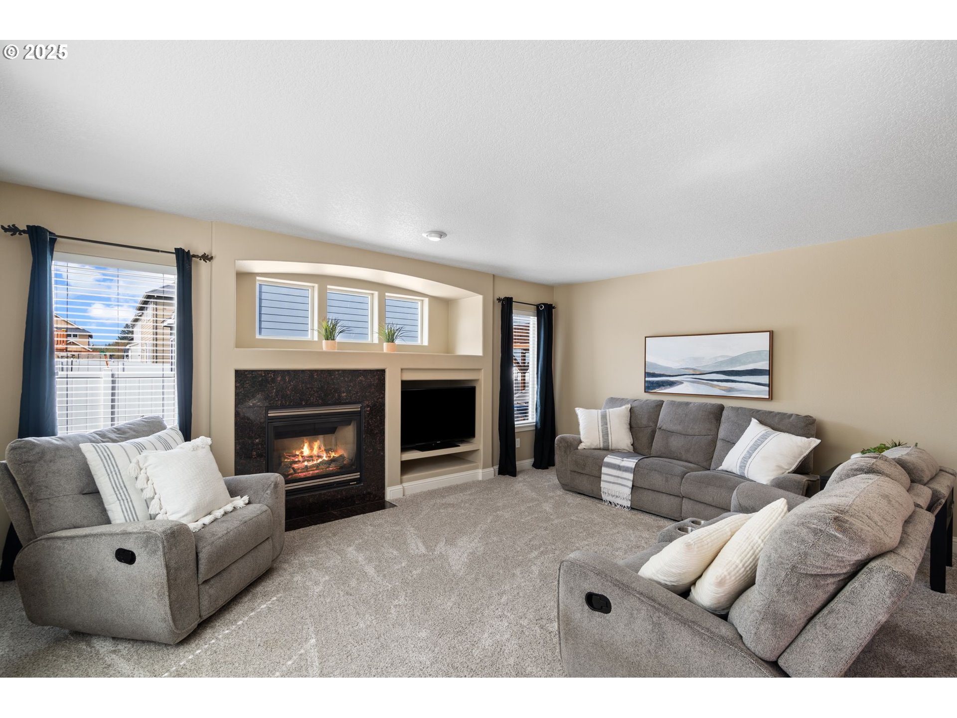 2597 North Lambert Street Cornelius, OR 97113 - Photo 20 of 48 a living room with furniture and a fireplace