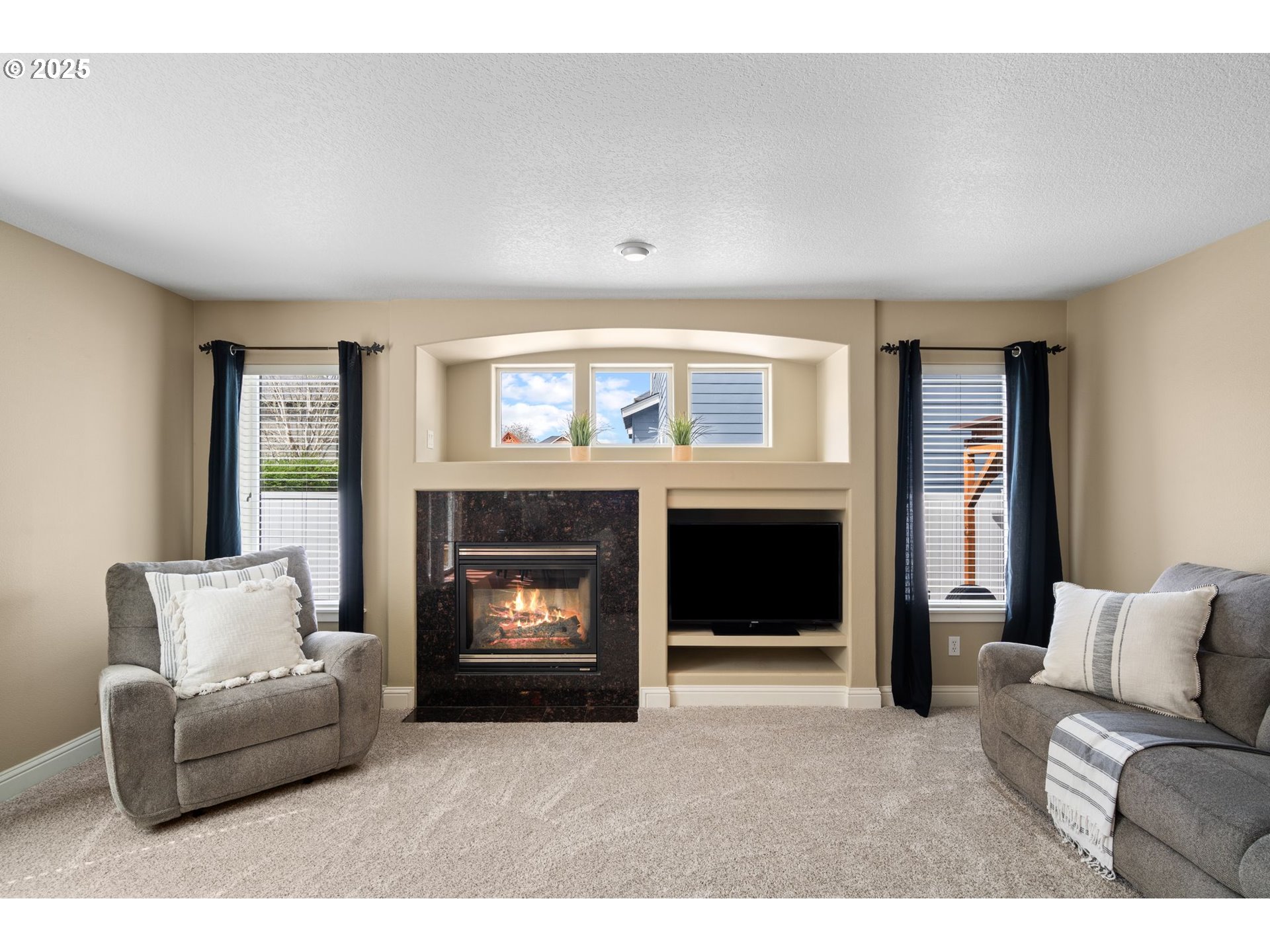 2597 North Lambert Street Cornelius, OR 97113 - Photo 21 of 48 a living room with furniture and a fireplace