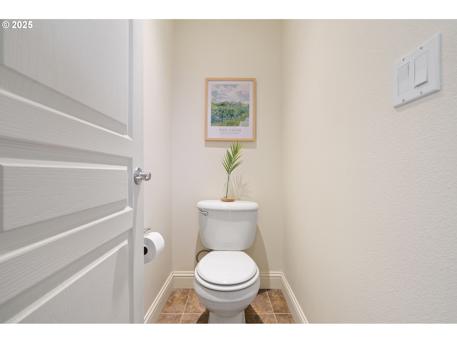 2597 North Lambert Street Cornelius, OR 97113 - Photo 34 of 48 a white toilet sitting next to a bathroom sink
