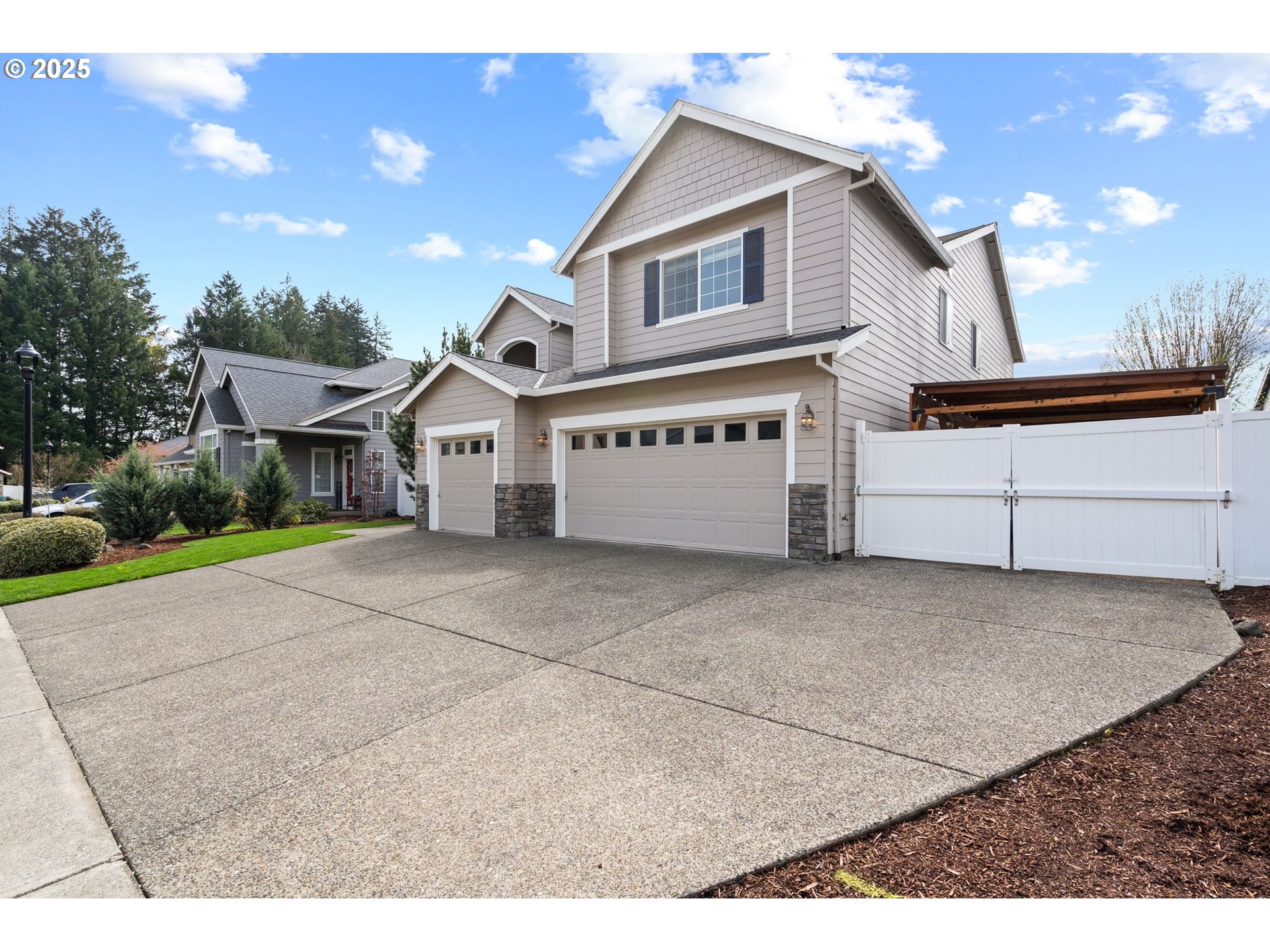 2597 North Lambert Street Cornelius, OR 97113 - Photo 4 of 48 a front view of a house with a yard