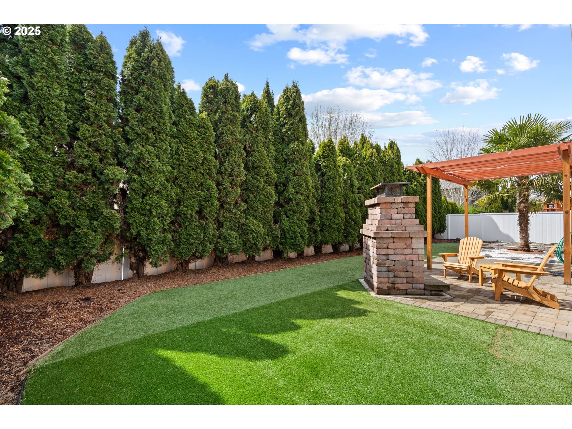 2597 North Lambert Street Cornelius, OR 97113 - Photo 45 of 48 a view of a backyard with sitting area