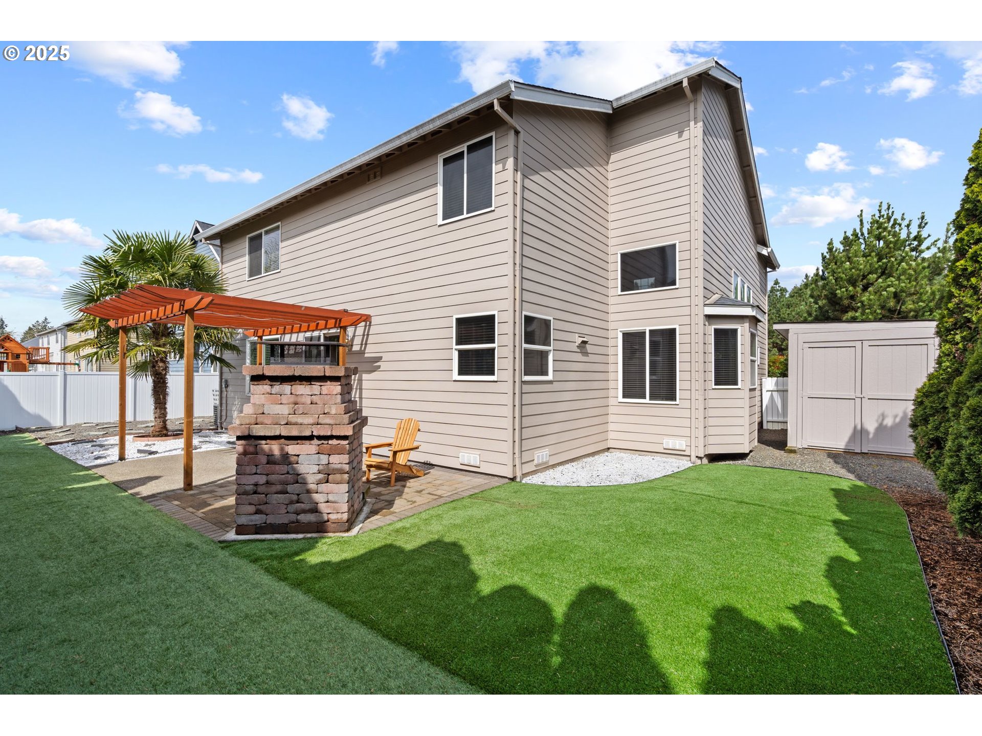 2597 North Lambert Street Cornelius, OR 97113 - Photo 46 of 48 a backyard of a house with table and chairs