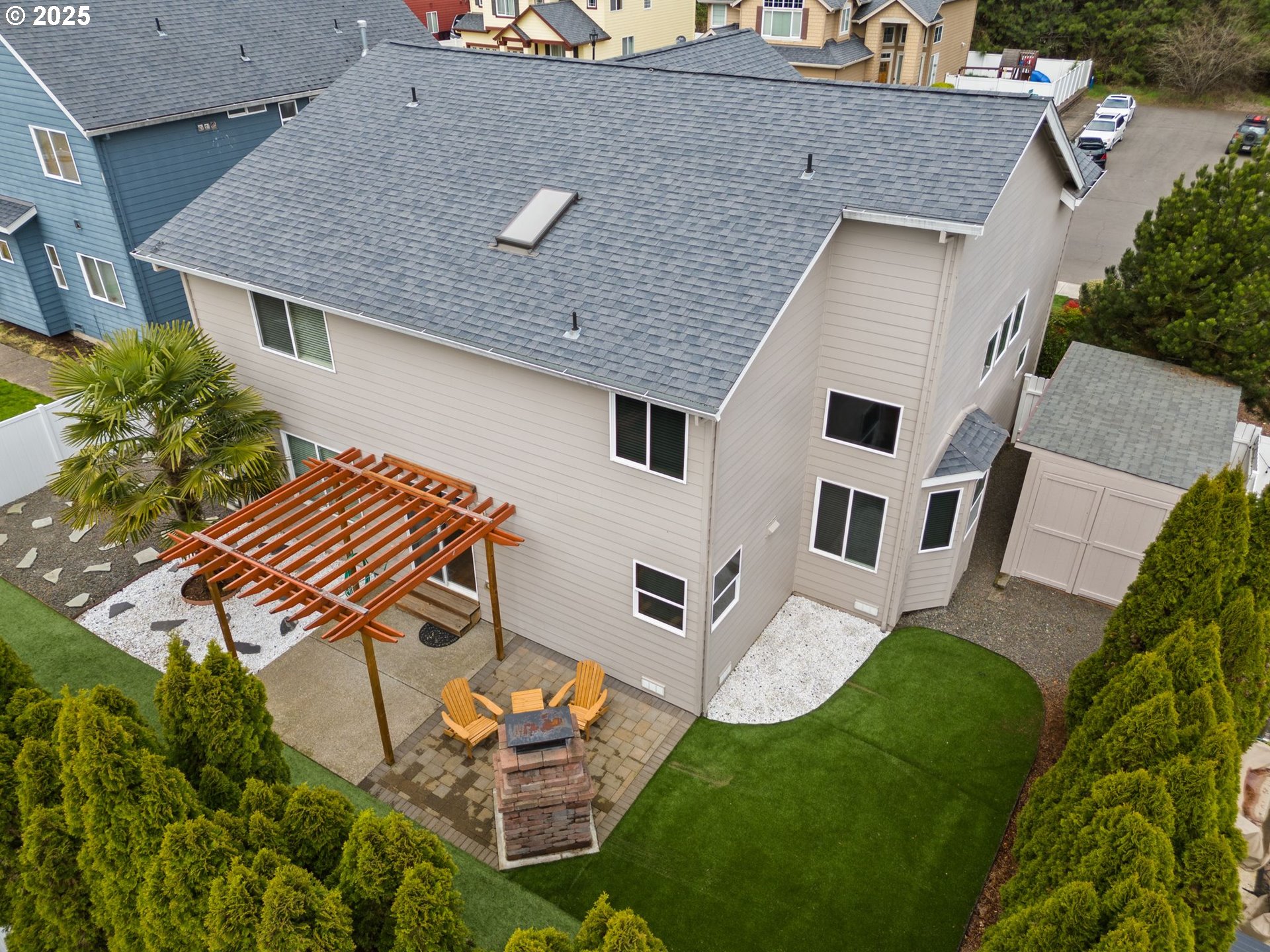2597 North Lambert Street Cornelius, OR 97113 - Photo 6 of 48 an aerial view of a house with garden space and street view