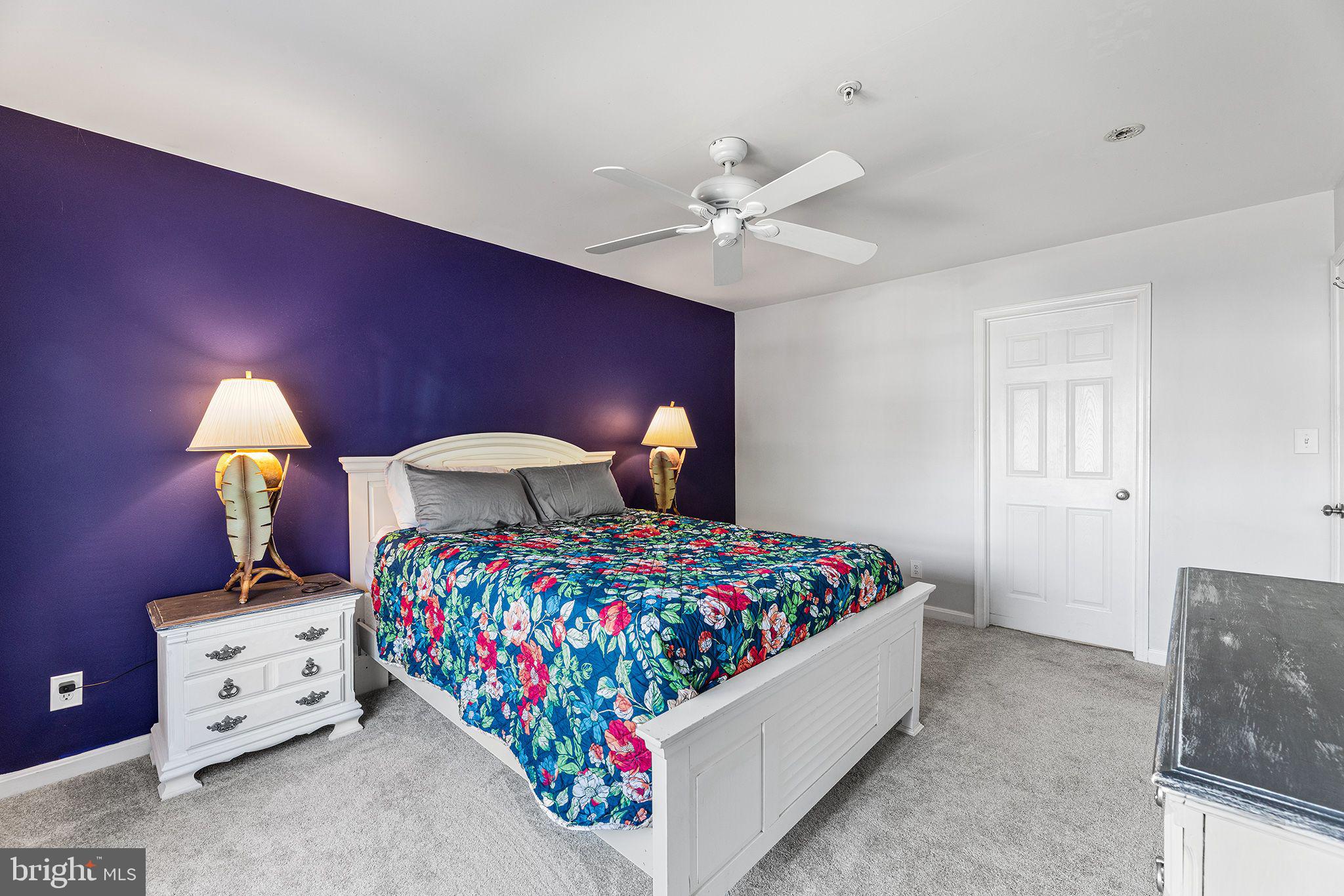 11431 Manklin Creek Road, Unit 5 Berlin, MD 21811 - Photo 14 of 38 a bedroom with a bed and window