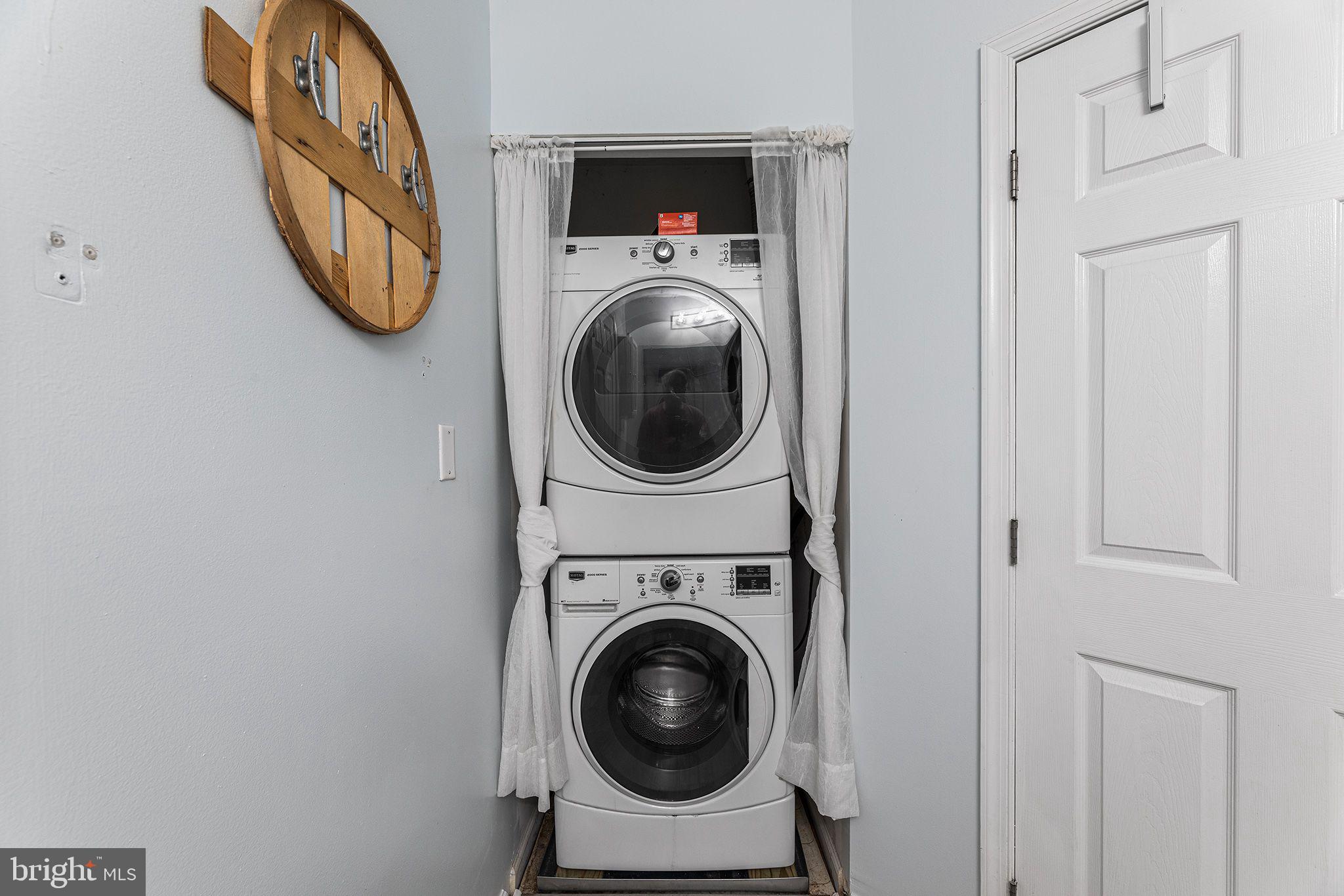 11431 Manklin Creek Road, Unit 5 Berlin, MD 21811 - Photo 38 of 38 a utility room with dryer and washer