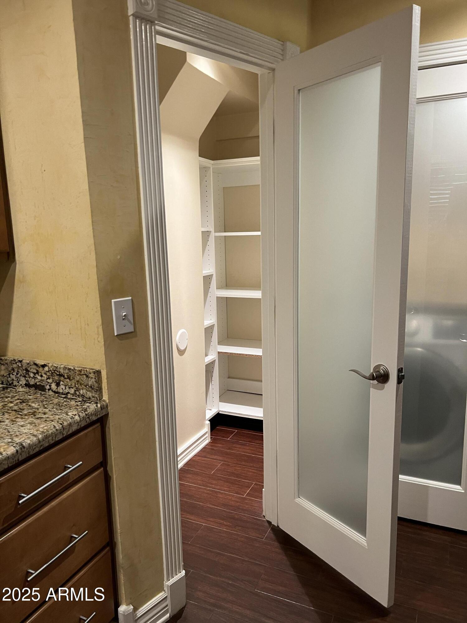 4573 South Mill Avenue Tempe, AZ 85282 - Photo 11 of 32 a view of walk in closet with empty racks