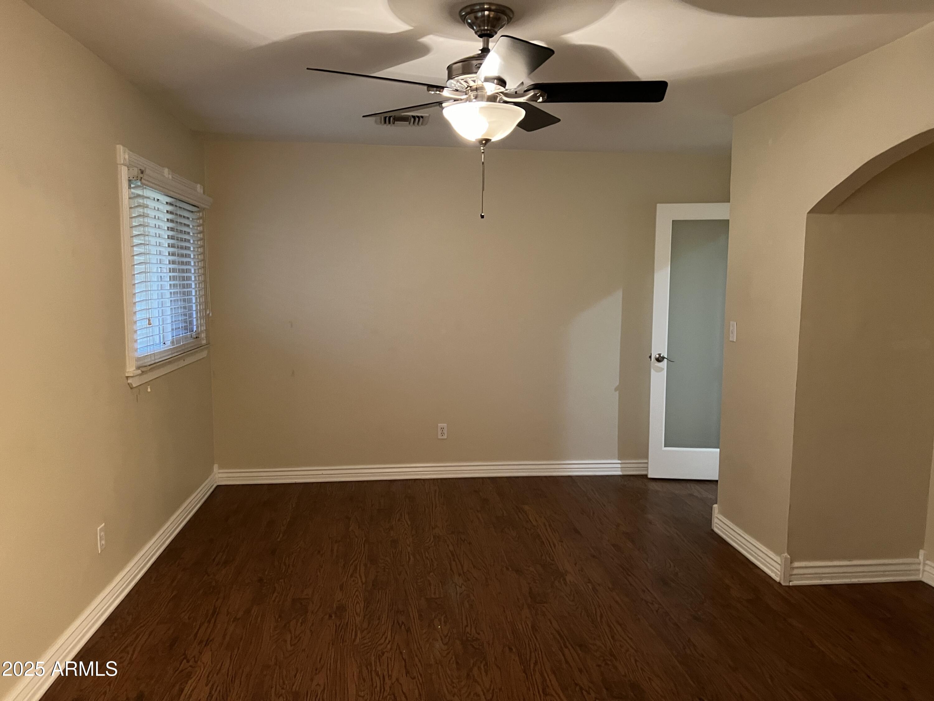 4573 South Mill Avenue Tempe, AZ 85282 - Photo 19 of 32 wooden floor in an empty room with a window