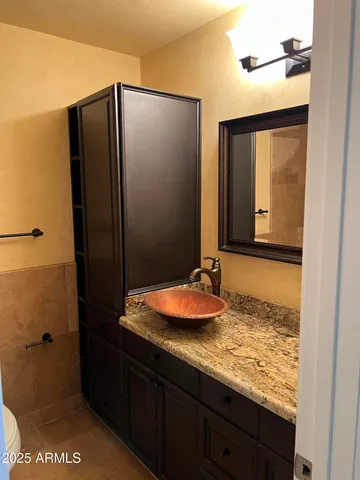 a bathroom with a sink and a toilet