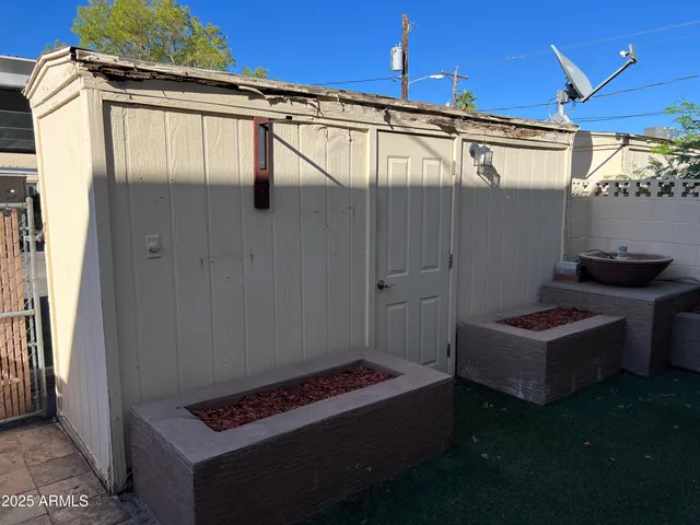 a view of front door of house and yard