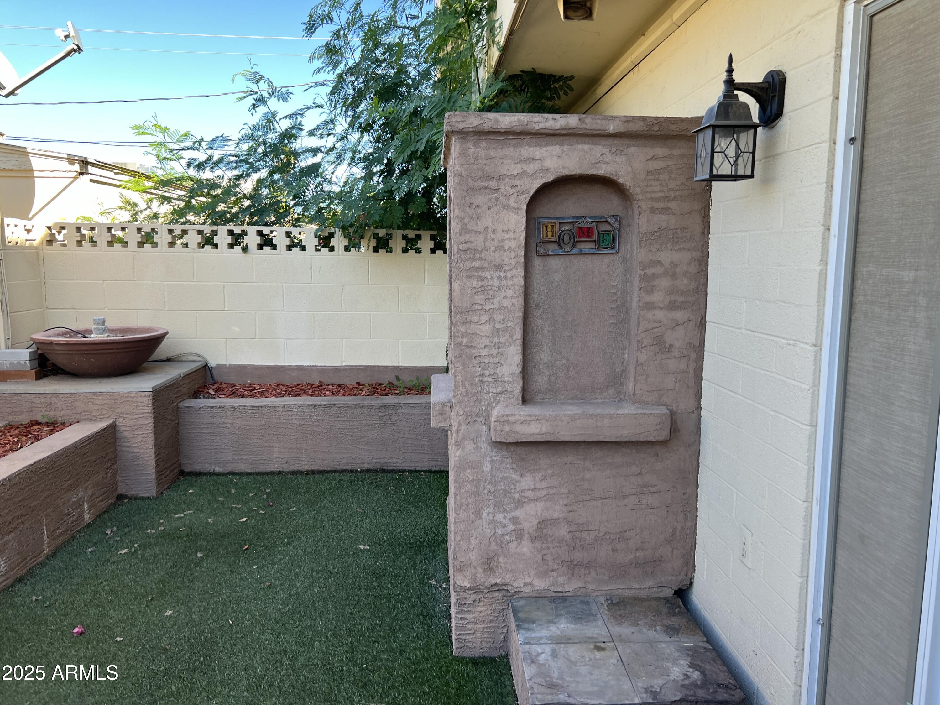 4573 South Mill Avenue Tempe, AZ 85282 - Photo 30 of 32 a view of front door of house and yard