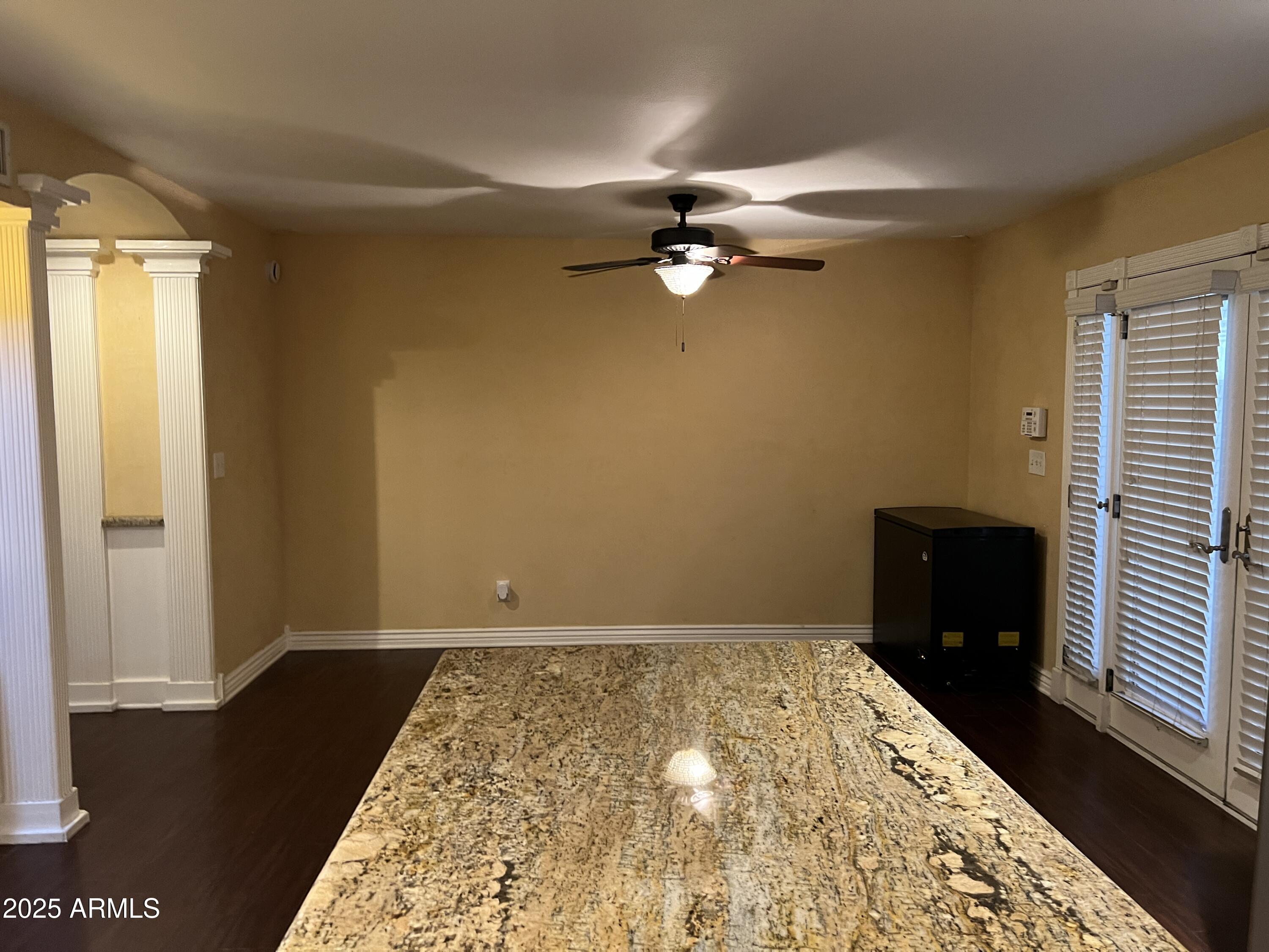 4573 South Mill Avenue Tempe, AZ 85282 - Photo 9 of 32 wooden floor in an empty room