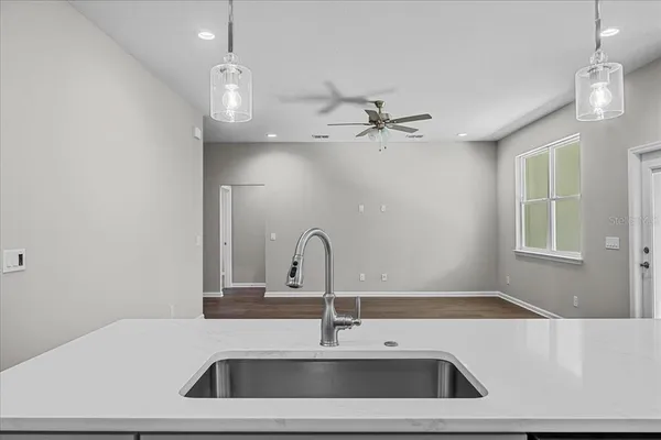 a sink with a close view of a faucet