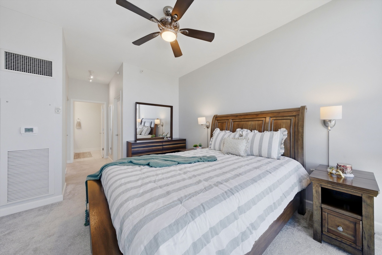 1629 South Prairie Avenue, Unit 2709 Chicago, IL 60616 - Photo 21 of 37 a bedroom with bed and a chandelier