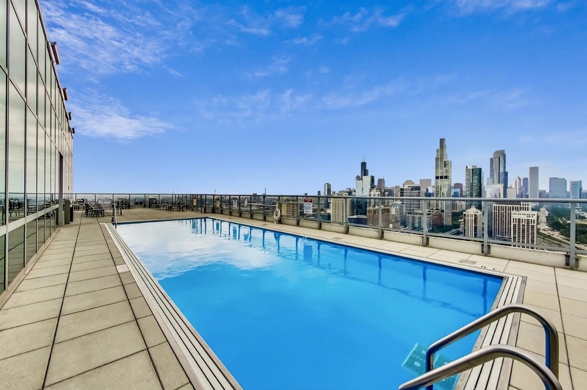 1629 South Prairie Avenue, Unit 2709 Chicago, IL 60616 - Photo 27 of 37 a view of a swimming pool with a chairs