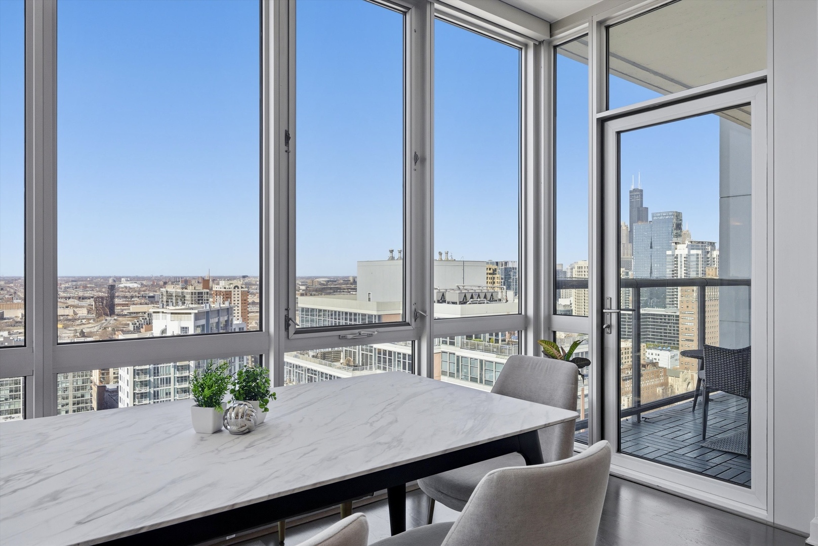 1629 South Prairie Avenue, Unit 2709 Chicago, IL 60616 - Photo 10 of 37 a view of a dining room with furniture and window