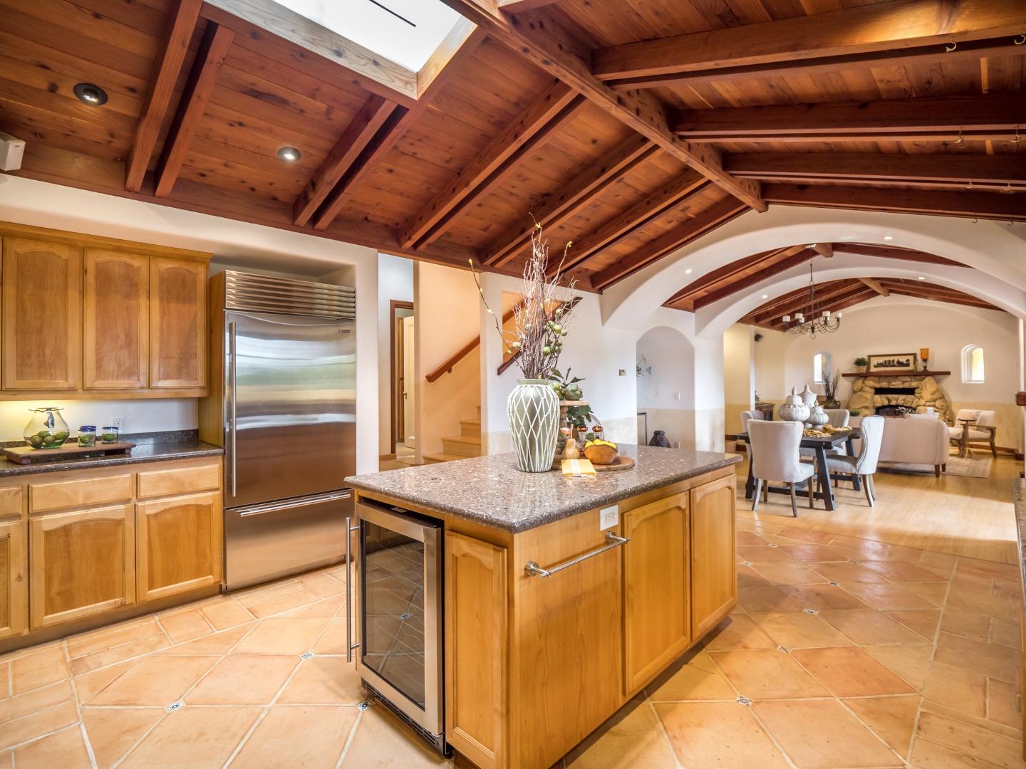 700 Enos Lane Watsonville, CA 95076 - Photo 11 of 56 a view of a kitchen with kitchen island a counter tops pace a sink and a stove