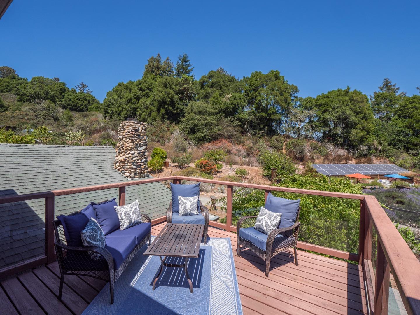 700 Enos Lane Watsonville, CA 95076 - Photo 25 of 56 an outdoor sitting area with furniture and wooden floor
