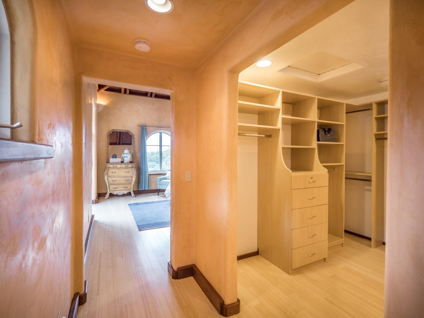 700 Enos Lane Watsonville, CA 95076 - Photo 26 of 56 a view of a hallway with wooden floor and closet