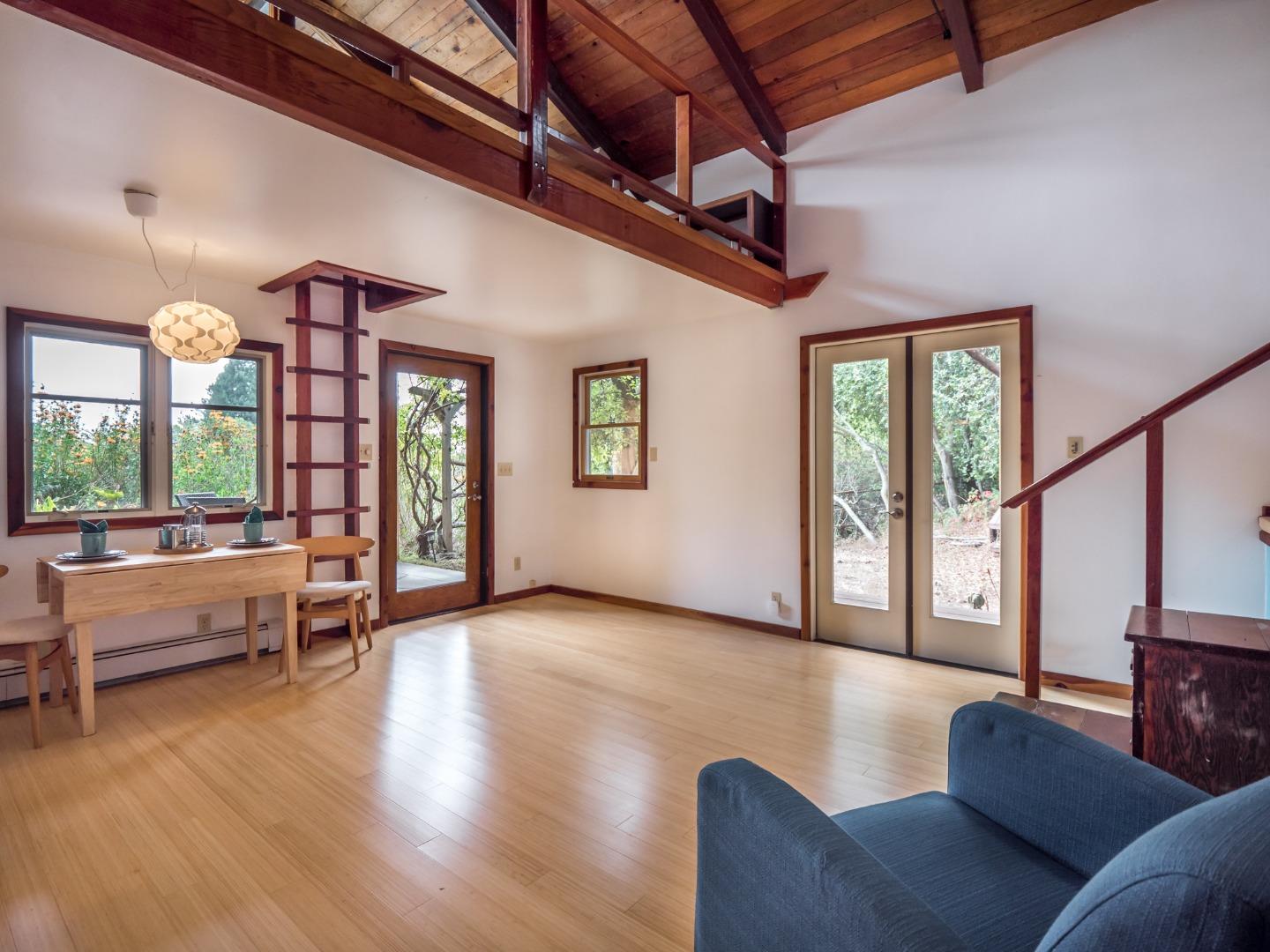 700 Enos Lane Watsonville, CA 95076 - Photo 30 of 56 a living room with furniture and a large window