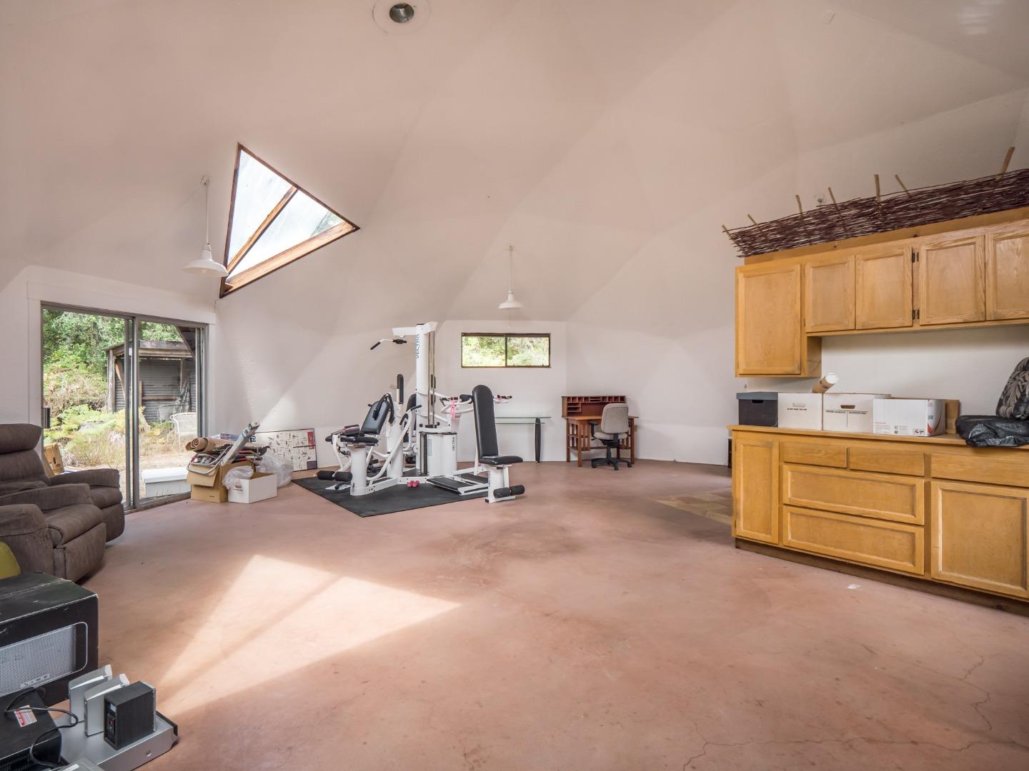700 Enos Lane Watsonville, CA 95076 - Photo 48 of 56 a view of a livingroom with furniture and a garage