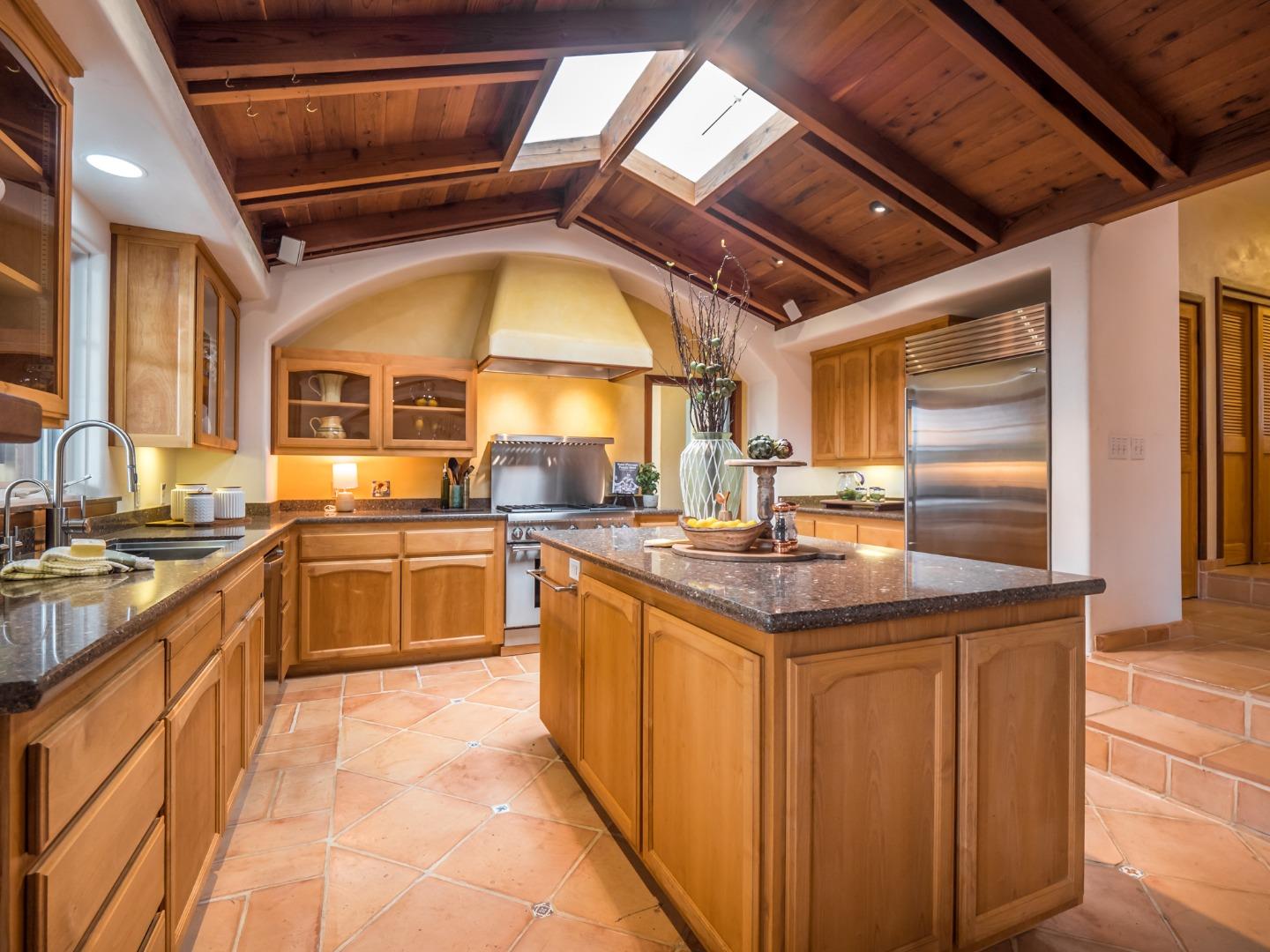 700 Enos Lane Watsonville, CA 95076 - Photo 8 of 56 a kitchen with stainless steel appliances granite countertop a stove and a sink