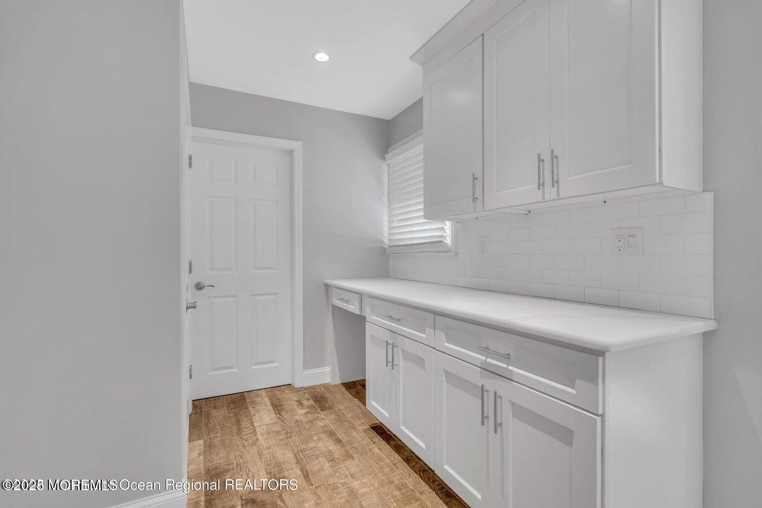 2253 Llewellyn Parkway Forked River, NJ 08731 - Photo 15 of 42 a view of storage and utility room with cabinets