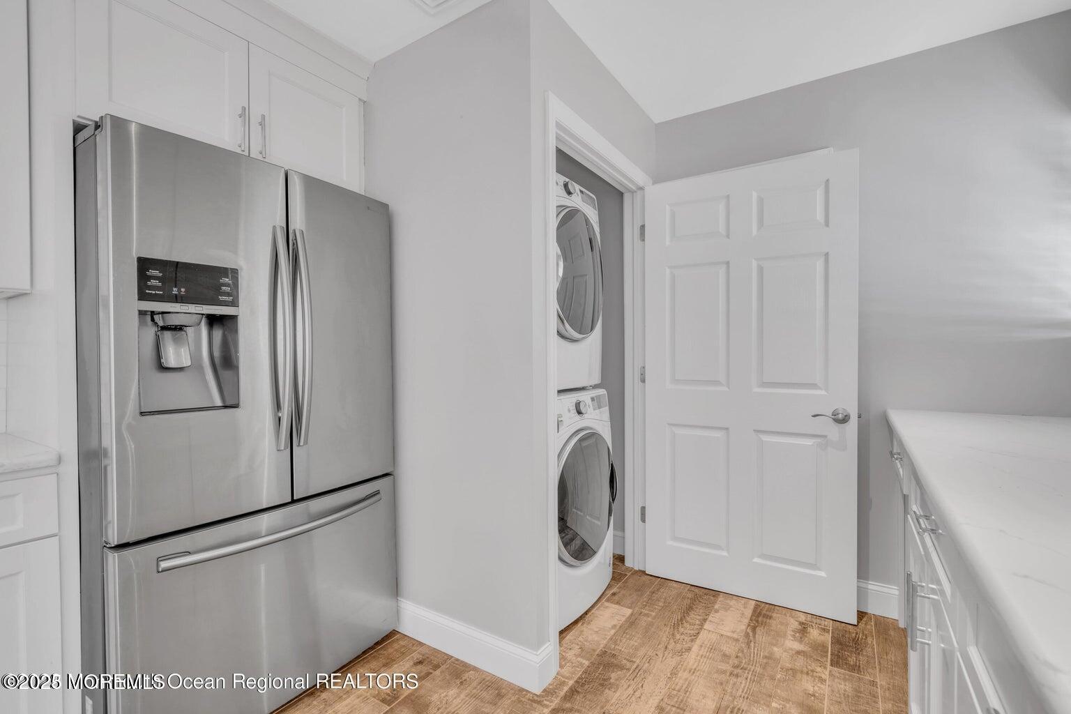 2253 Llewellyn Parkway Forked River, NJ 08731 - Photo 20 of 42 a kitchen with stainless steel appliances a refrigerator and a stove top oven