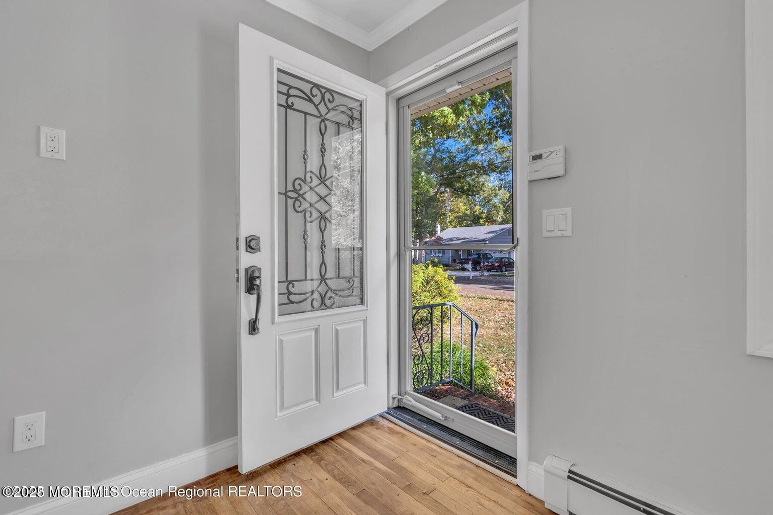 2253 Llewellyn Parkway Forked River, NJ 08731 - Photo 2 of 42 a view of an entryway with wooden floor
