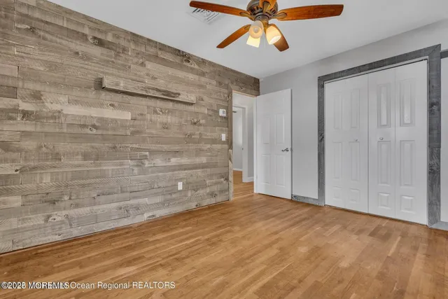 a bathroom with a sink a mirror and a toilet
