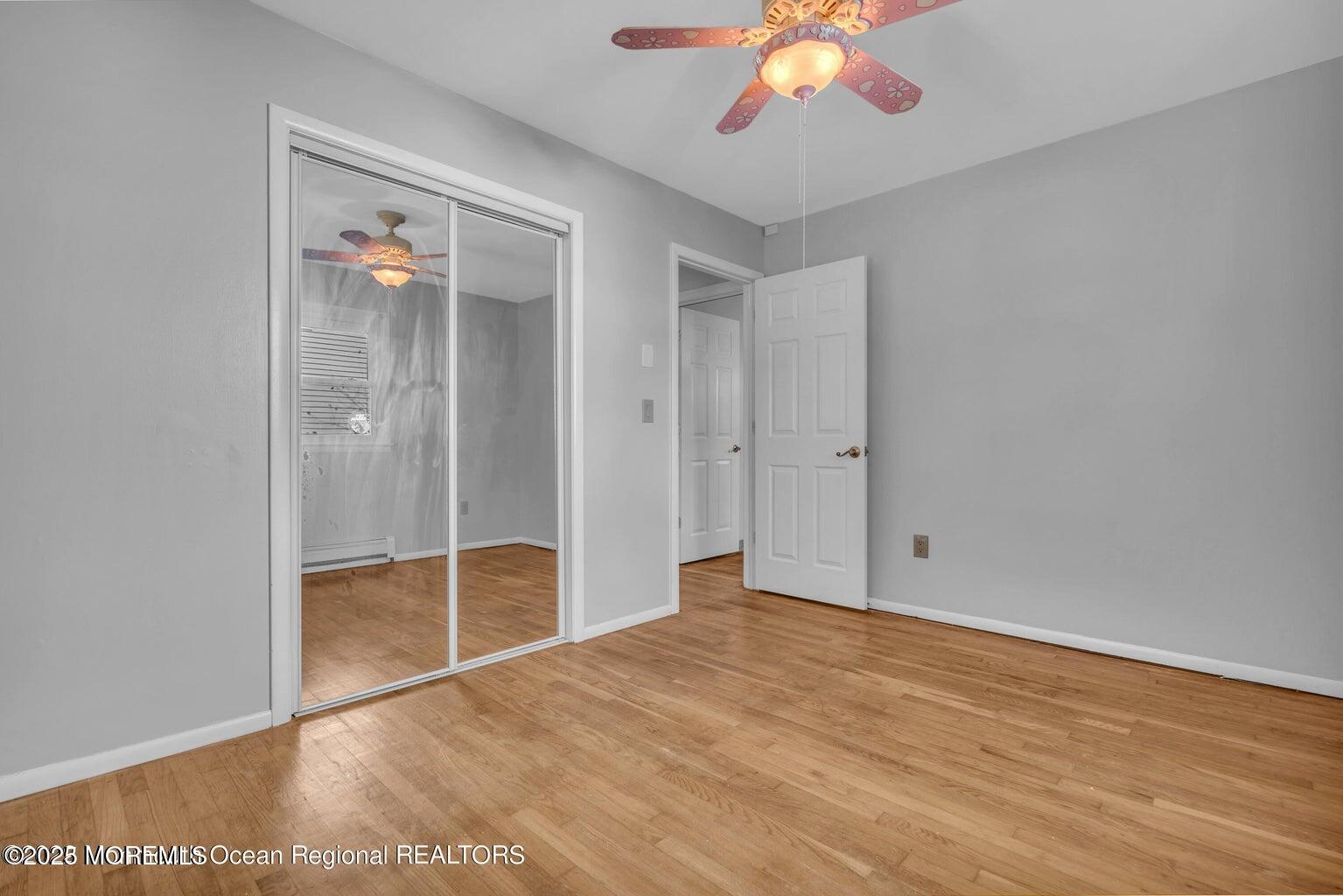 2253 Llewellyn Parkway Forked River, NJ 08731 - Photo 30 of 42 a view of an empty room with a chandelier fan