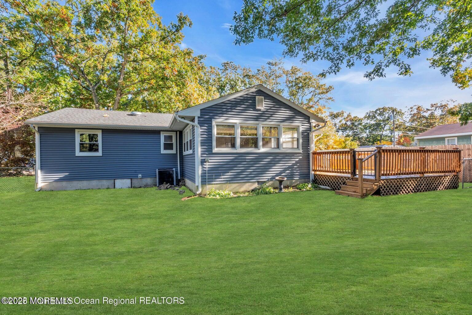 2253 Llewellyn Parkway Forked River, NJ 08731 - Photo 33 of 42 a view of a house with a yard