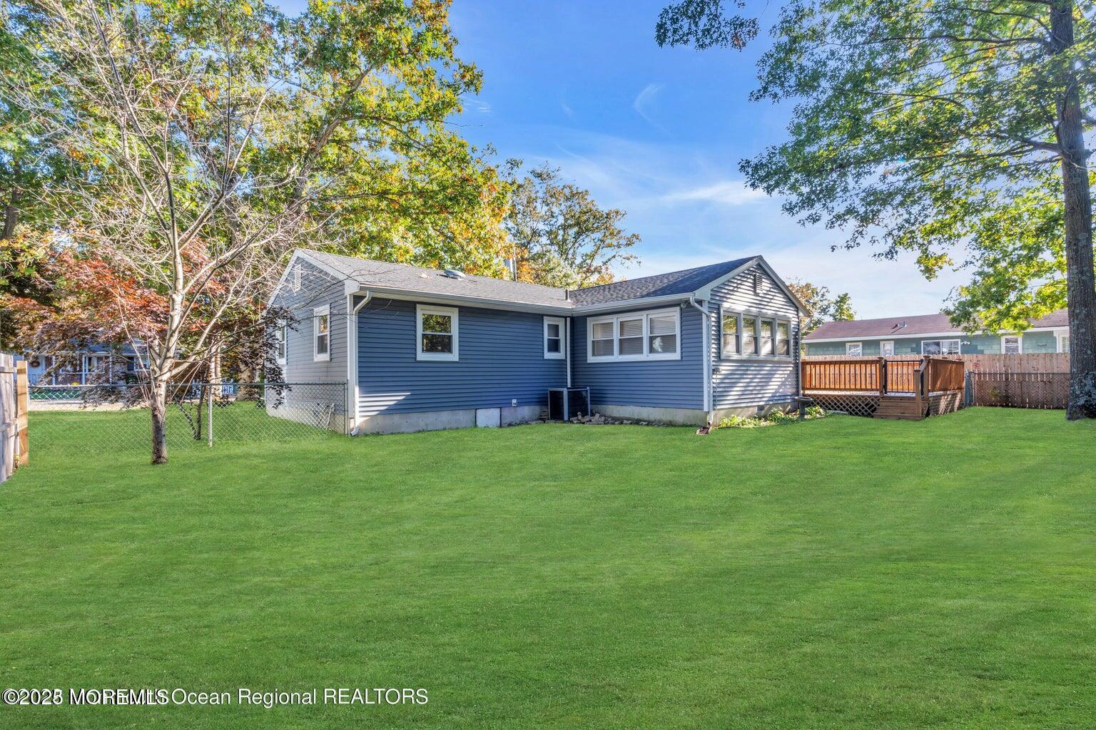 2253 Llewellyn Parkway Forked River, NJ 08731 - Photo 35 of 42 a front view of house with yard and green space