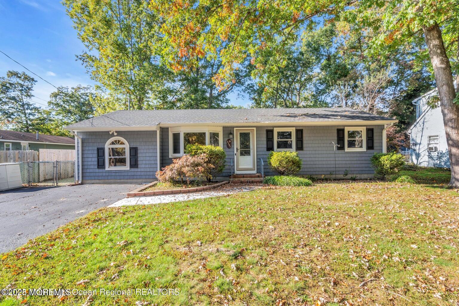 2253 Llewellyn Parkway Forked River, NJ 08731 - Photo 38 of 42 front view of a house with a yard