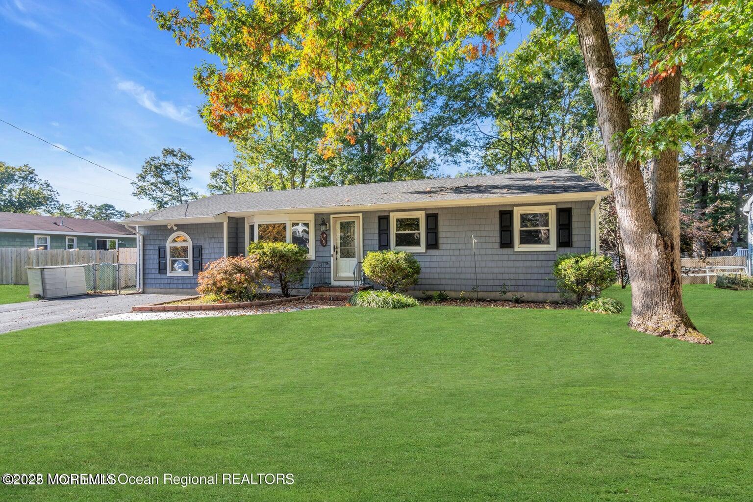 2253 Llewellyn Parkway Forked River, NJ 08731 - Photo 40 of 42 a view of a house with a backyard