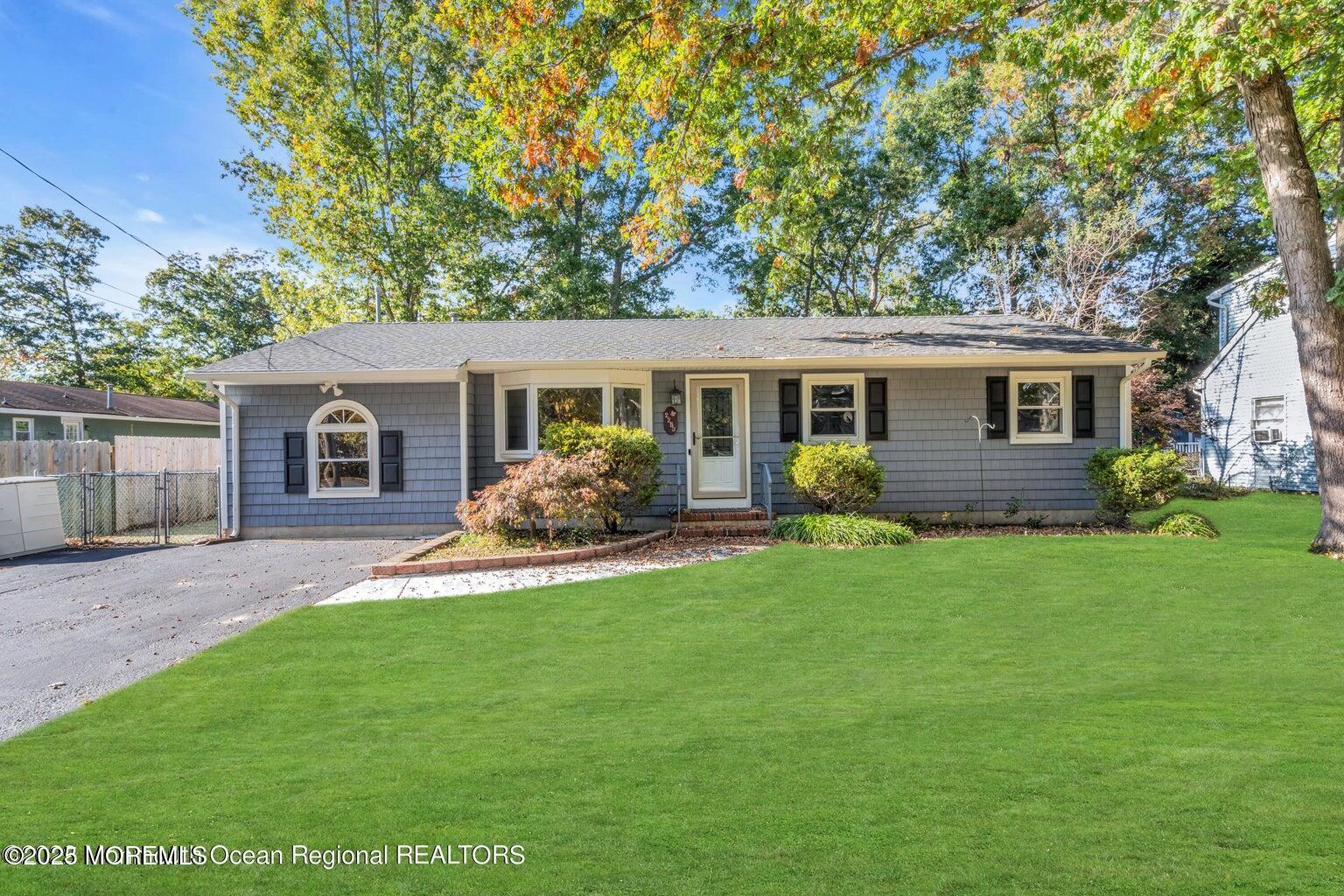 2253 Llewellyn Parkway Forked River, NJ 08731 - Photo 41 of 42 a front view of house with yard and green space