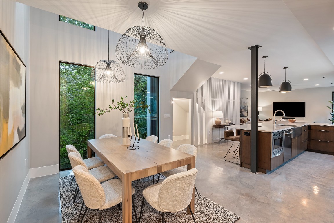 1327 Bonham Terrace, Unit B Austin, TX 78704 - Photo 17 of 40 a view of a dining room with furniture window and wooden floor