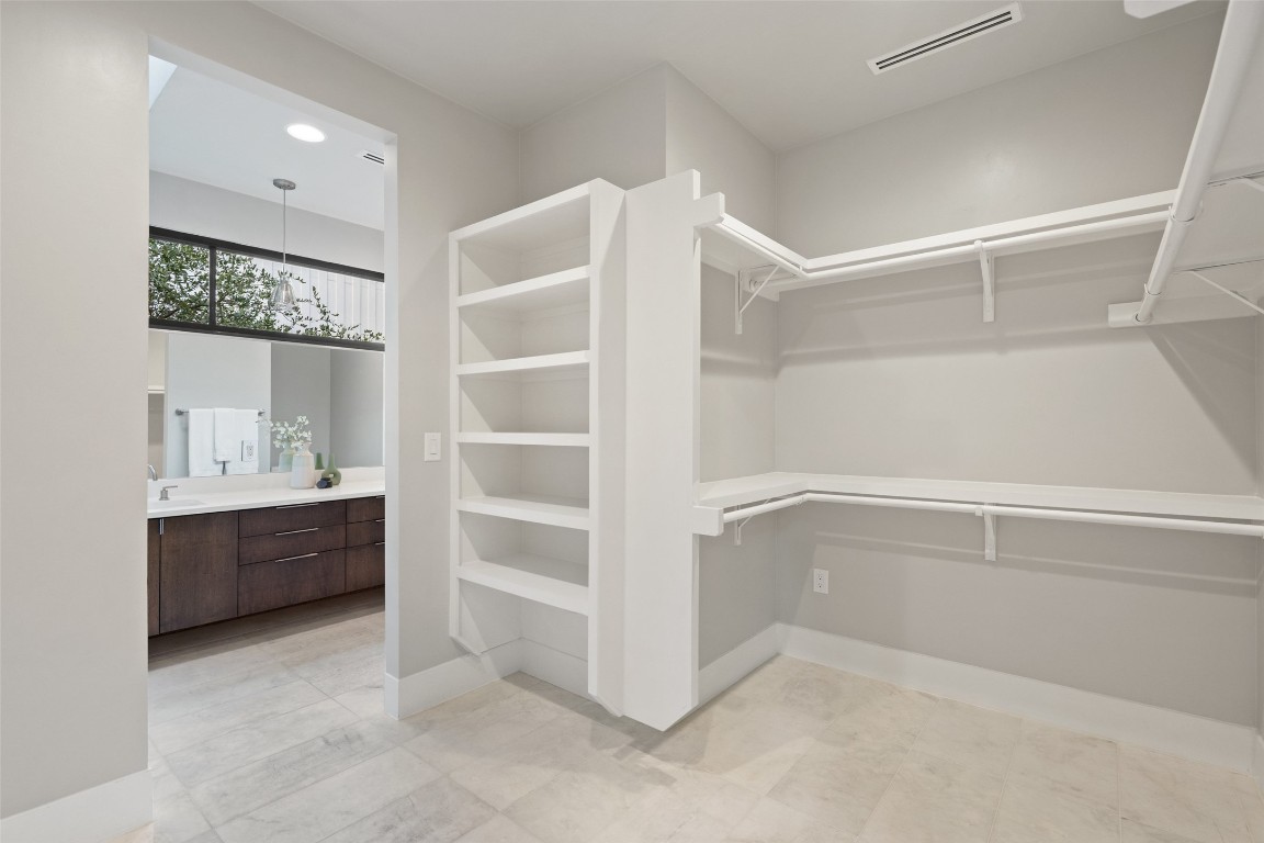 1327 Bonham Terrace, Unit B Austin, TX 78704 - Photo 24 of 40 a view of an empty walk in closet